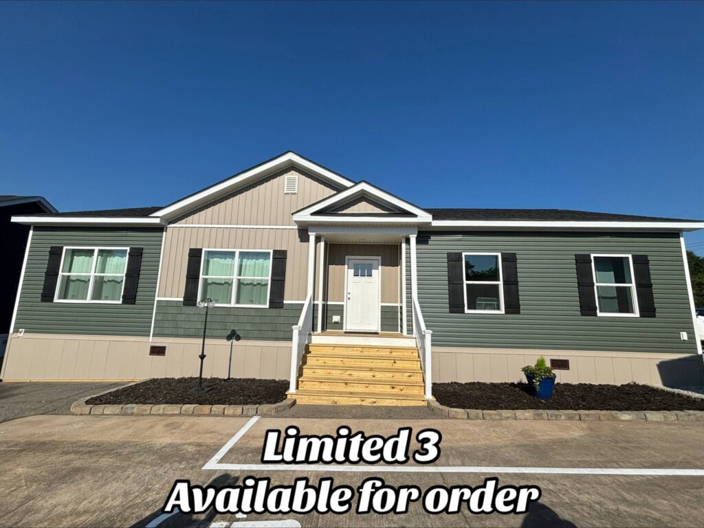 Front view of a modern manufactured home with a green and beige exterior. Wooden steps lead to the entrance. Text reads "Limited 3 Available for order."